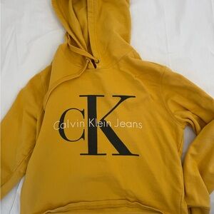 Calvin Klein Jeans Yellow Pullover Hoodie with CK Label